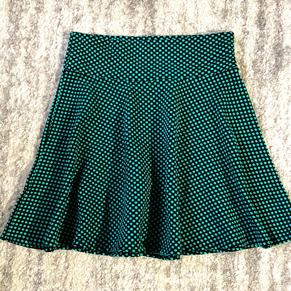 Green polka dot mini skirt